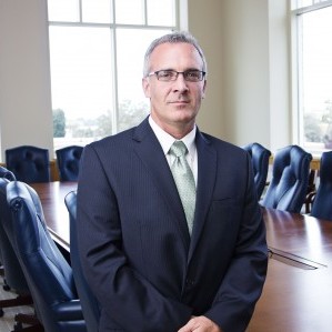 Confident Businessman portrait in a conference room